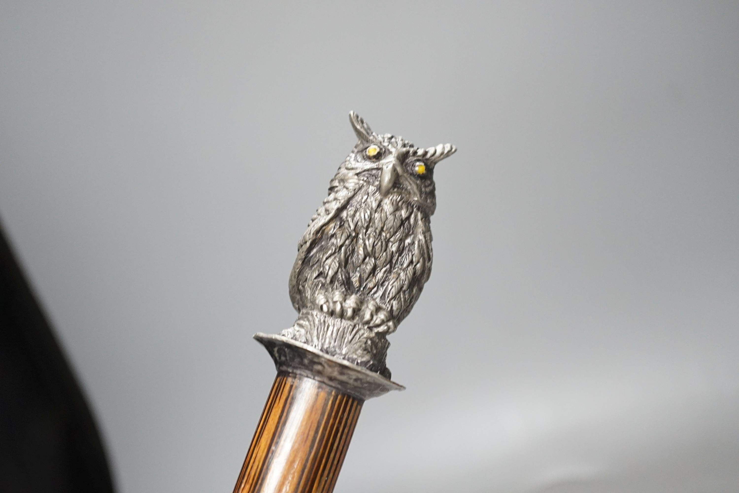 A silver mounted George V walking cane dated:London 1919 and 3 other canes, Silver mounted cane 92 cms long.